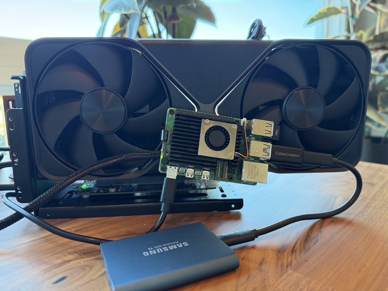 Hero image of a Raspberry Pi 5 alongside an RTX 5090