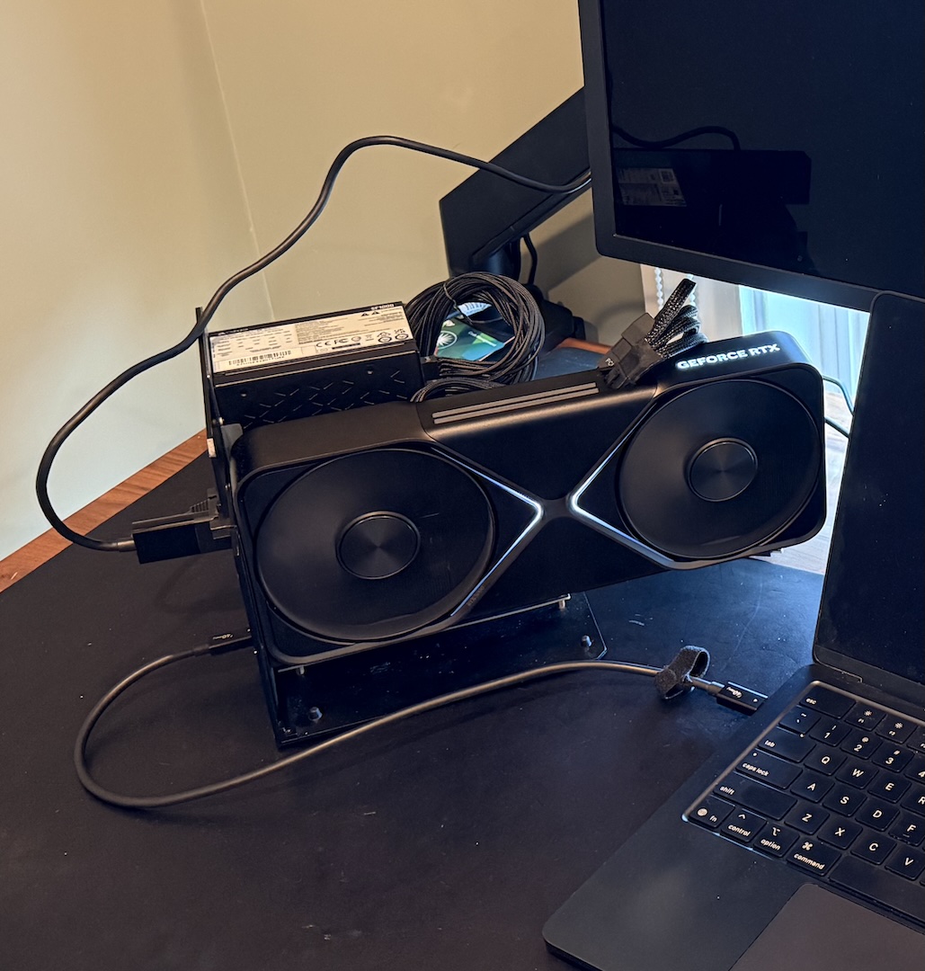 Thunderbolt from the laptop plugs into the GPU dock. The GPU plugs into the monitor via DisplayPort. Shortly after this was taken, I broke this dock.